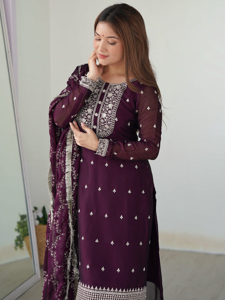 Beautiful purple silk pant suit with intricate embroidery and matching dupatta