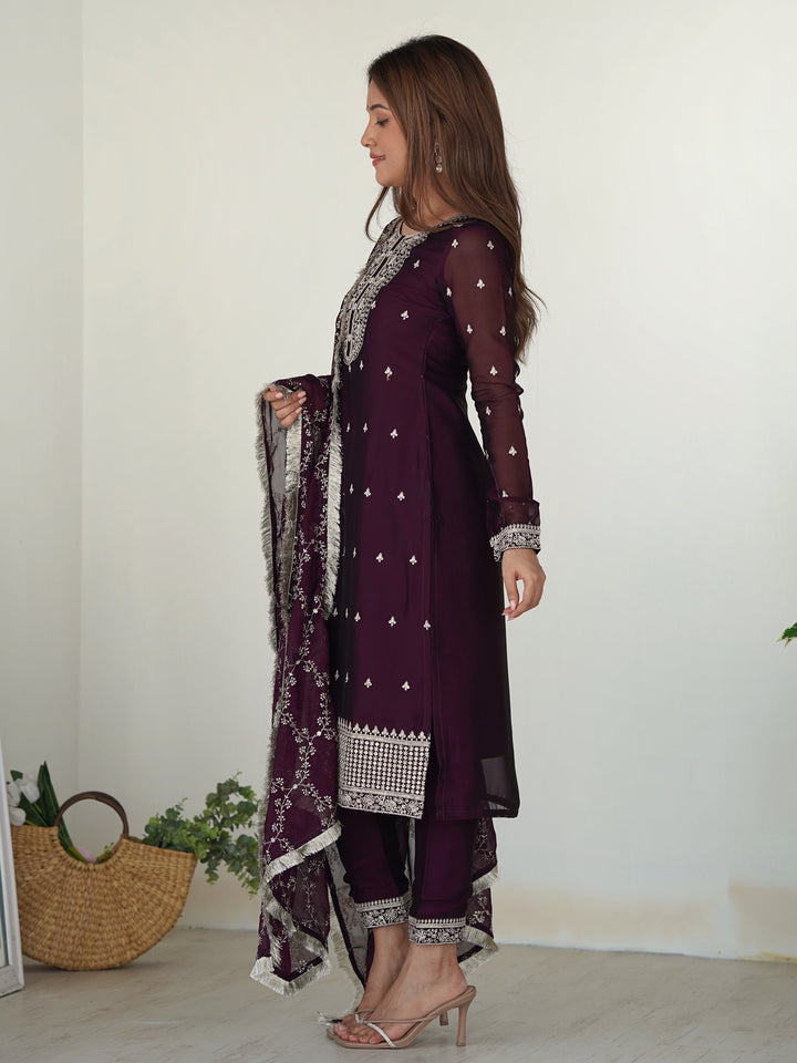 Exquisite purple silk pant suit with intricate embroidery and matching dupatta
