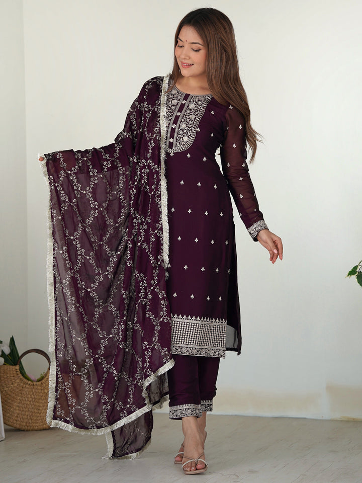 Beautiful purple silk pant suit with intricate embroidery and matching dupatta