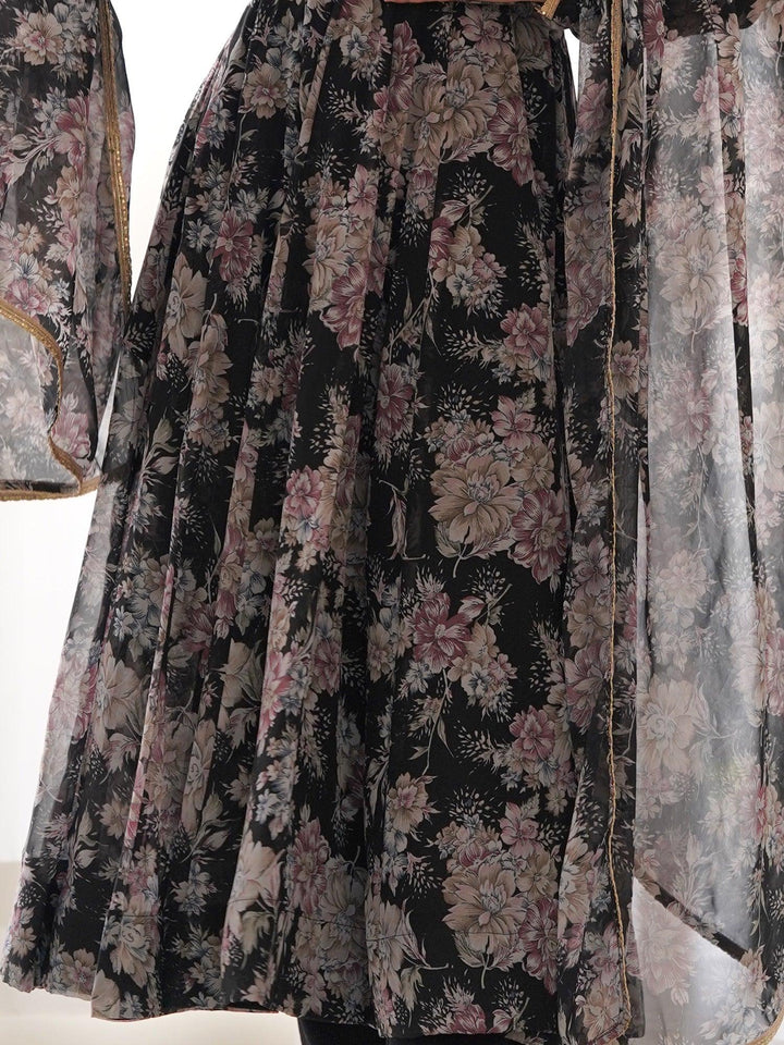 Timeless elegance with contemporary charm in a black floral printed pant suit