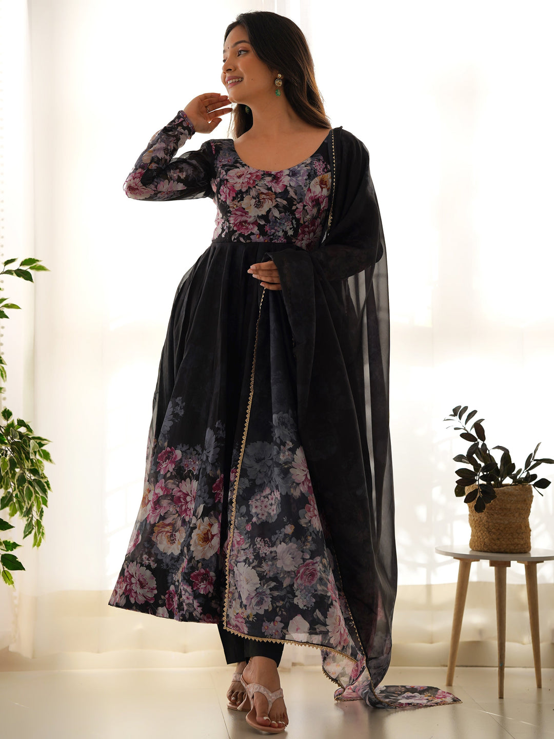 
Adorable Black Floral Printed Organza Traditional Anarkali Suit with intricate floral print work on black fabric