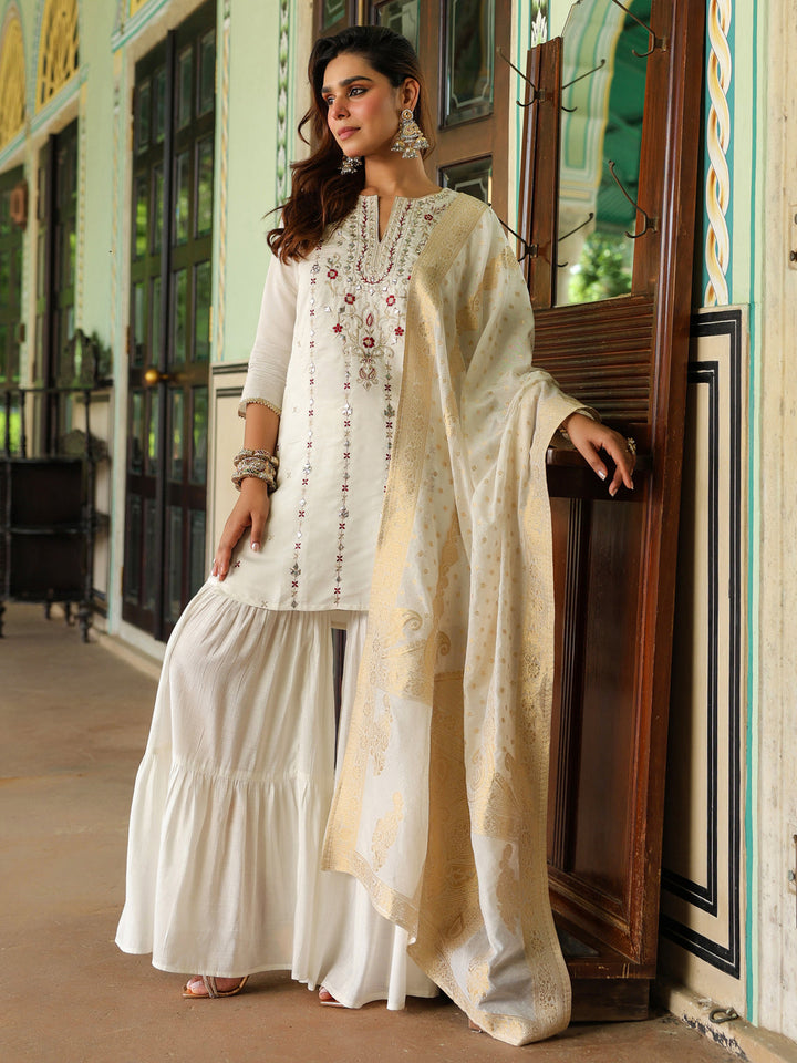 Janasya Women's Off White Chanderi Silk Embroidered Mirror Work Kurta With Sharara & Dupatta Set