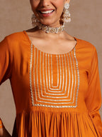 Janasya Women's Mustard Rayon Yoke Design A-line Kurta Set