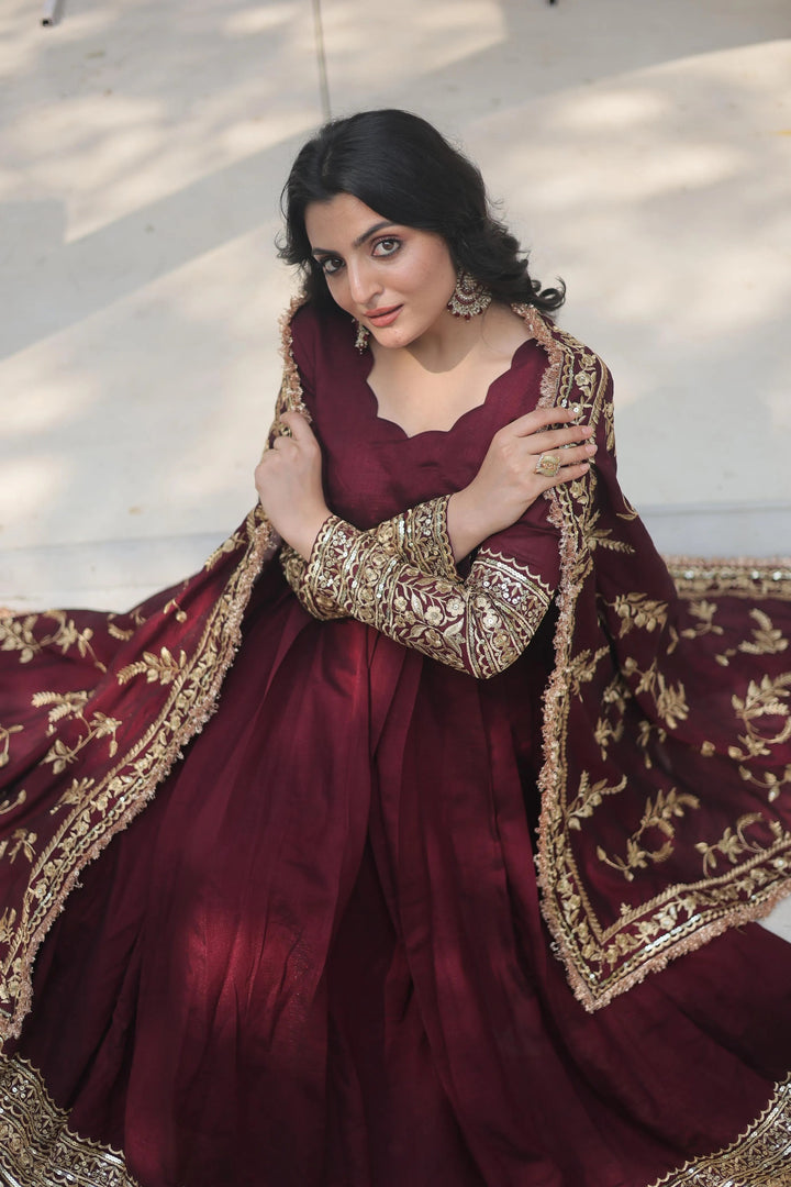 Maroon Vichitra Shimmer Gown featuring 35 meter flair and designer lace border on the dupatta