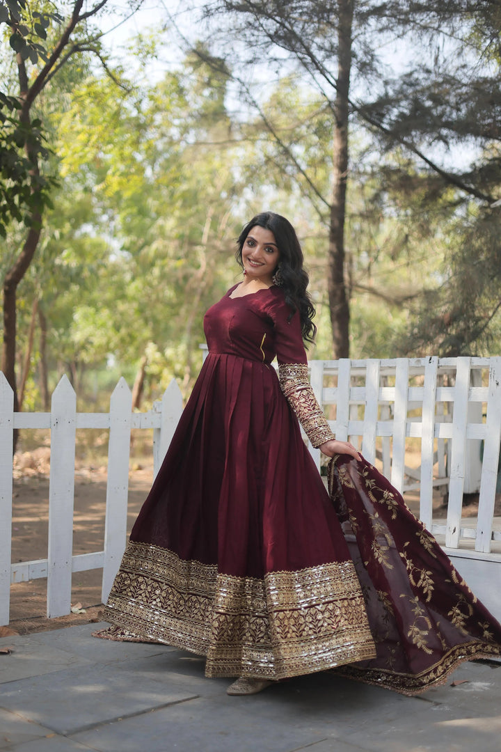 Maroon Vichitra Shimmer Gown with full sleeves and stitched canvas patta for added elegance