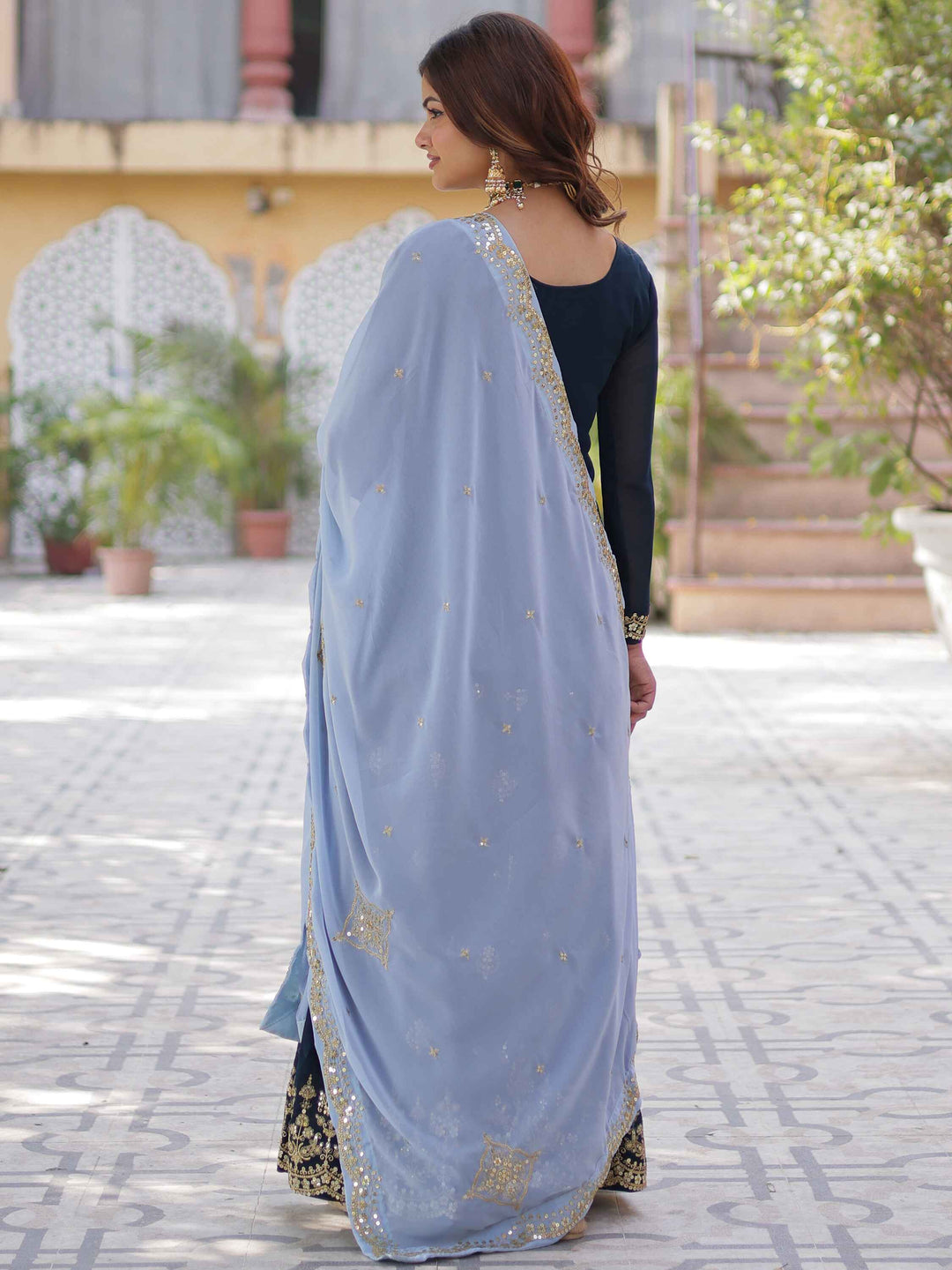 Ethereal dupatta drapes beautifully, adding glamour and charm