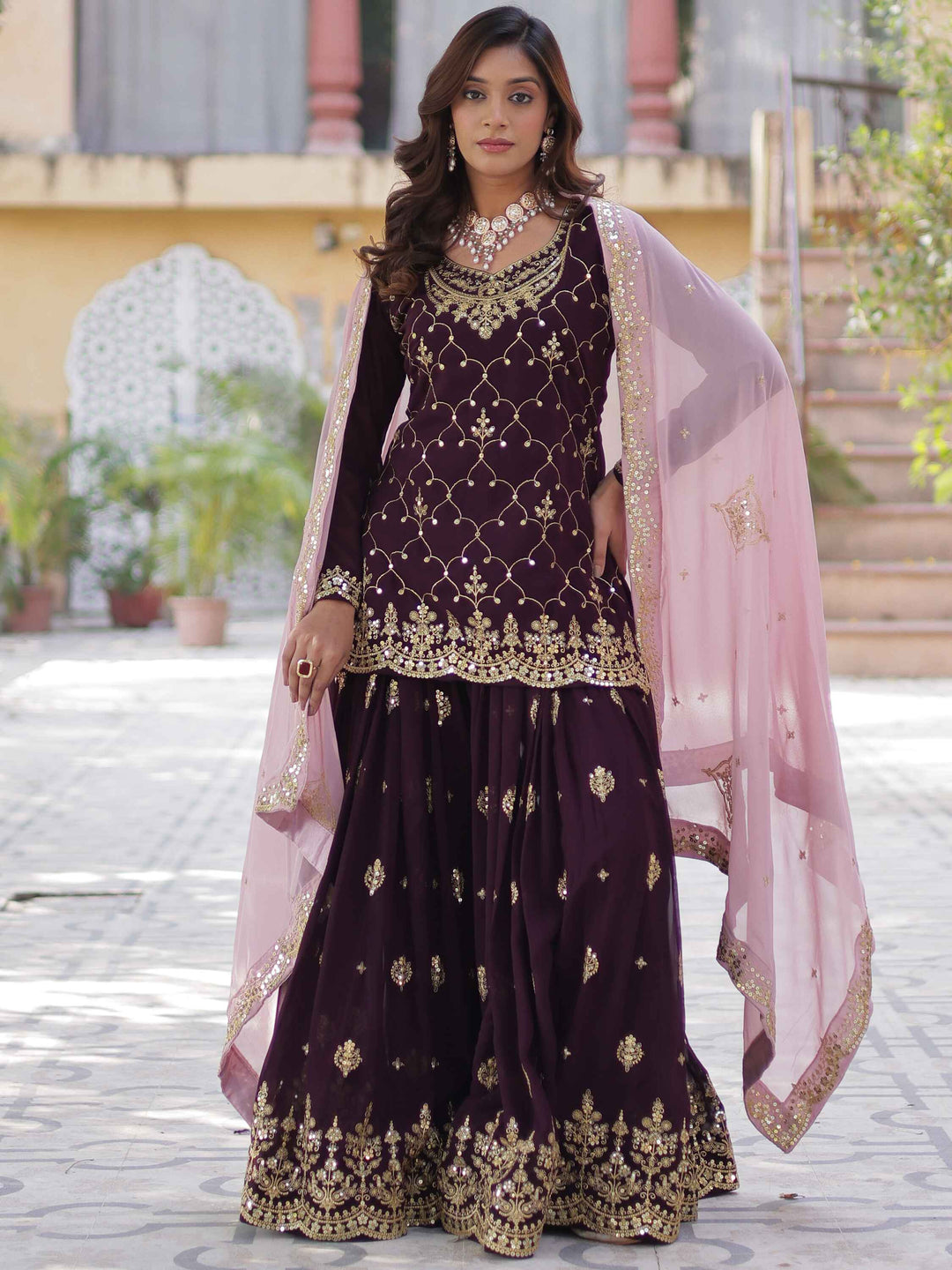 Luxurious wine-colored faux blooming fabric designer kurti with intricate sequins embroidery