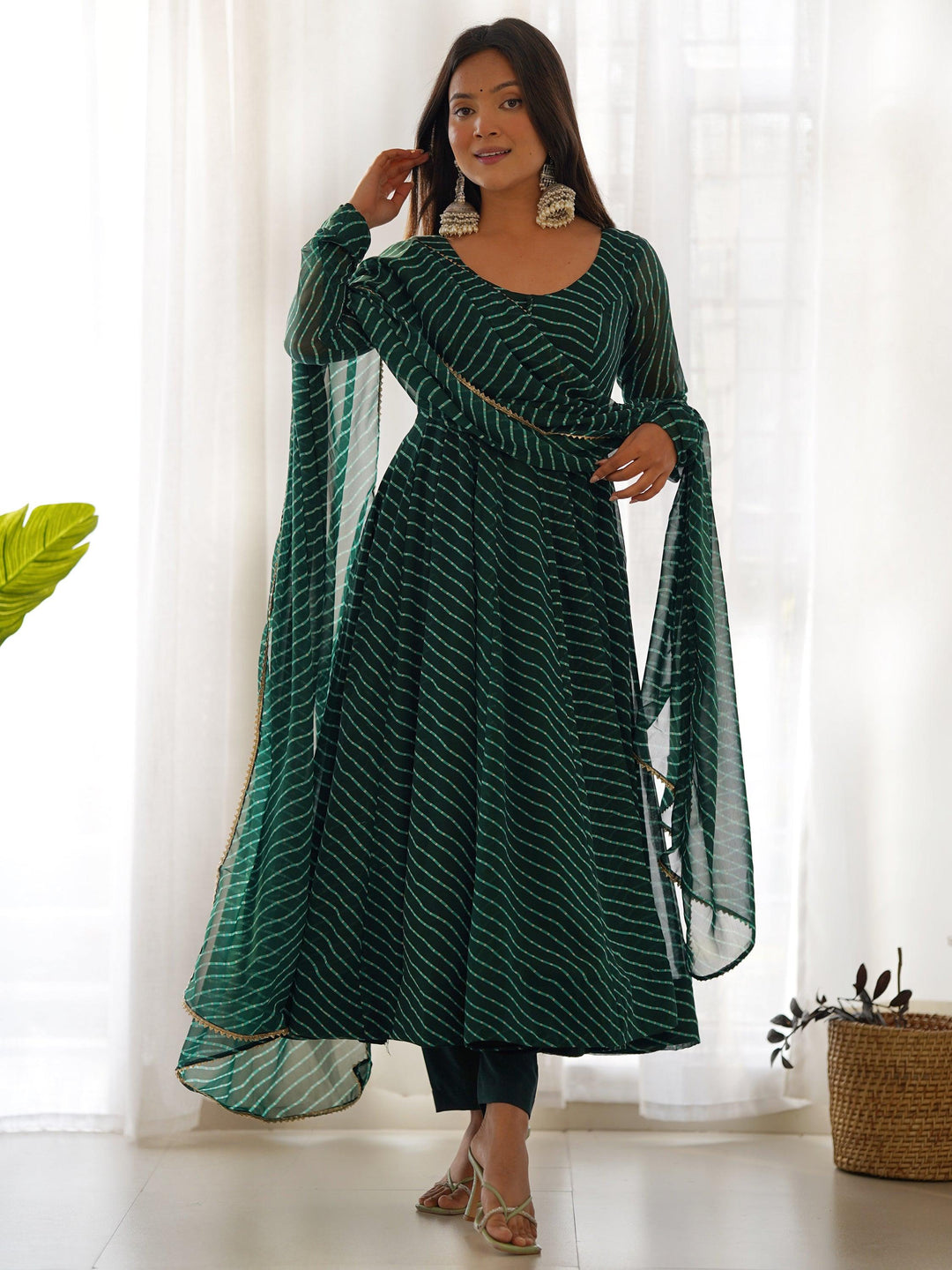 
Green georgette anarkali suit with Laheriya print work 