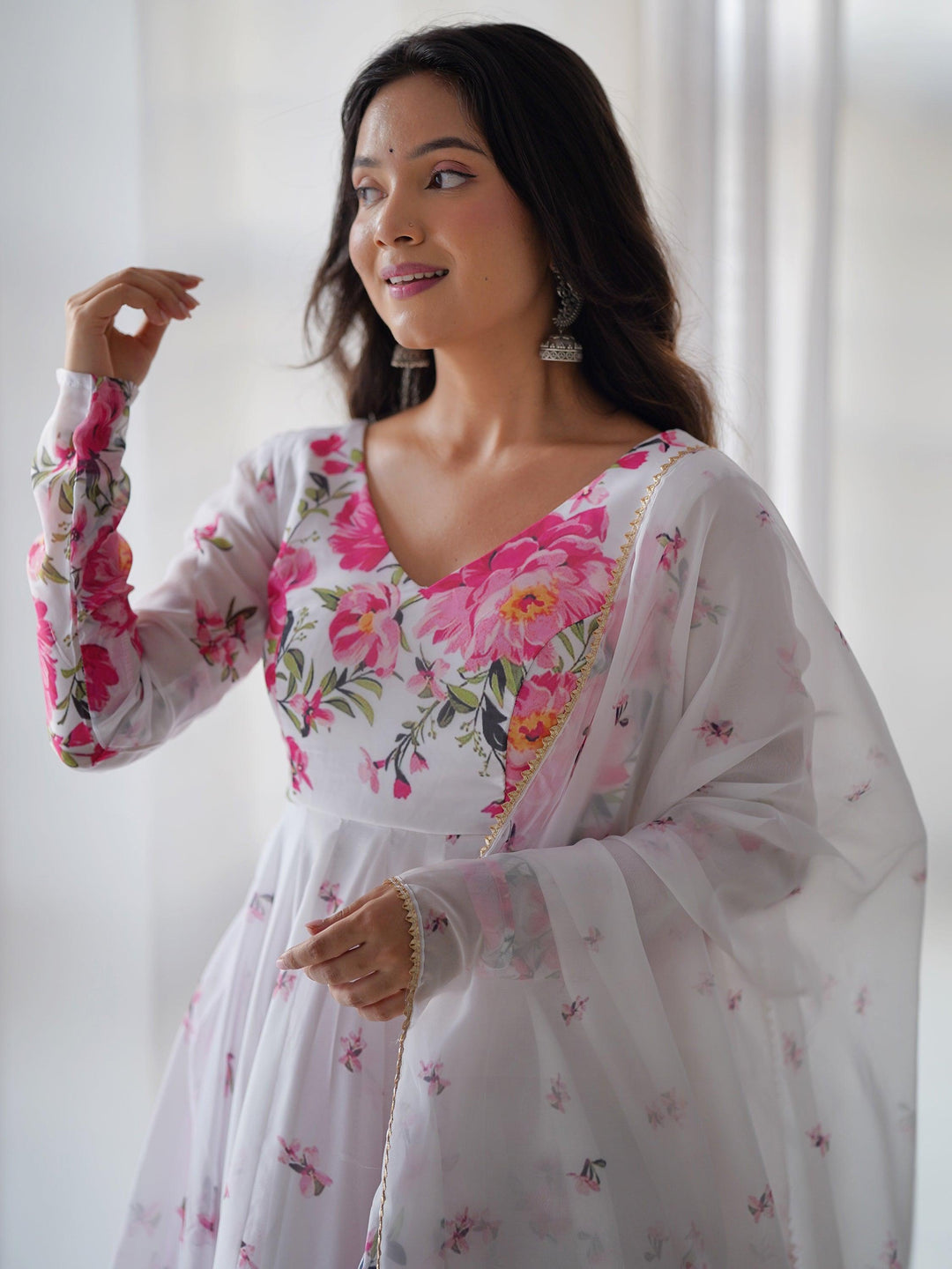 Enchanting white floral printed organza festival wear anarkali suit, perfect for grand celebrations and casual gatherings