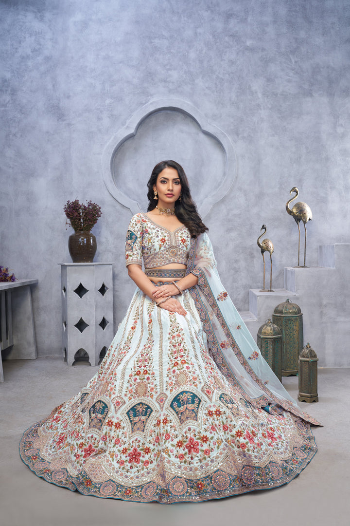 Stunning Sky Blue Lehenga with Zari Paisley Embroidery, Silk Patches, and Peacock Motifs - qivii