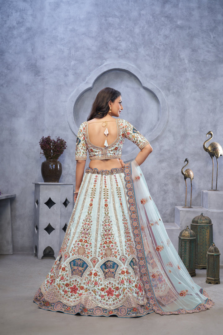 Stunning Sky Blue Lehenga with Zari Paisley Embroidery, Silk Patches, and Peacock Motifs - qivii