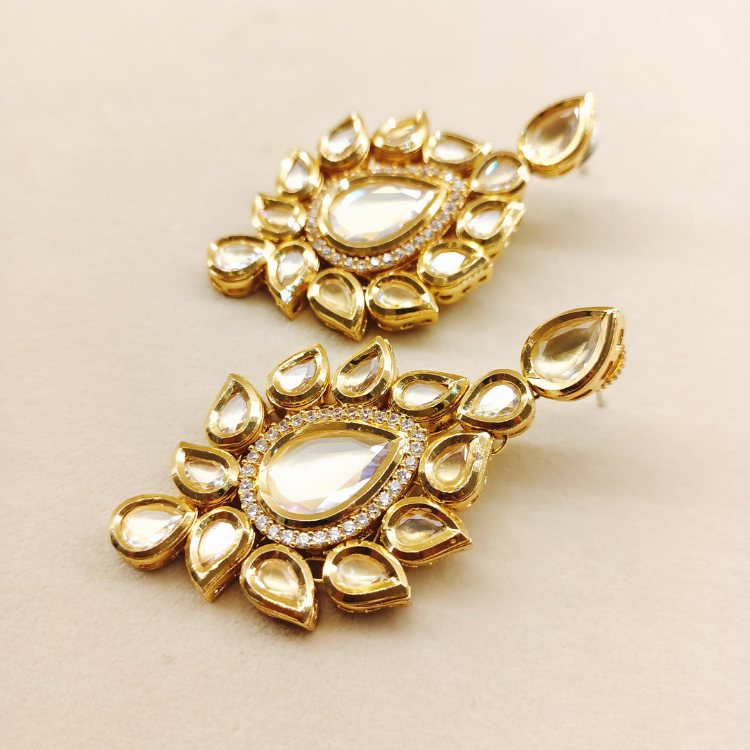 Elegant and luxurious gold plated Kundan earrings with high quality copper and American diamond accents