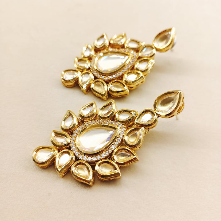 Elegant and luxurious gold plated Kundan earrings with high quality copper and American diamond accents