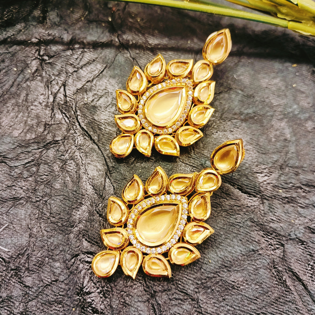 Gorgeous gold plated earrings with exquisite Kundan and high quality American diamond stones