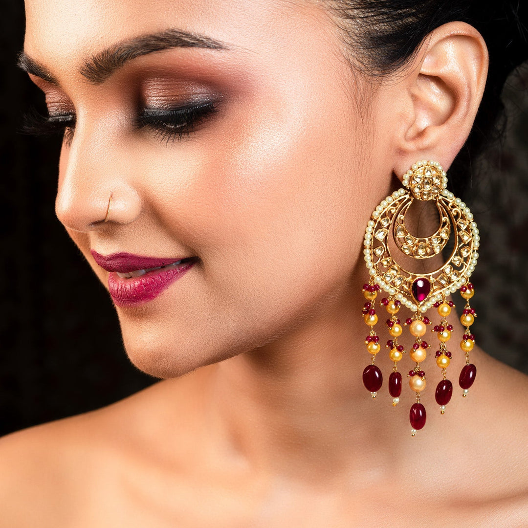Gold plated Kundan earrings with long danglers and ruby stones