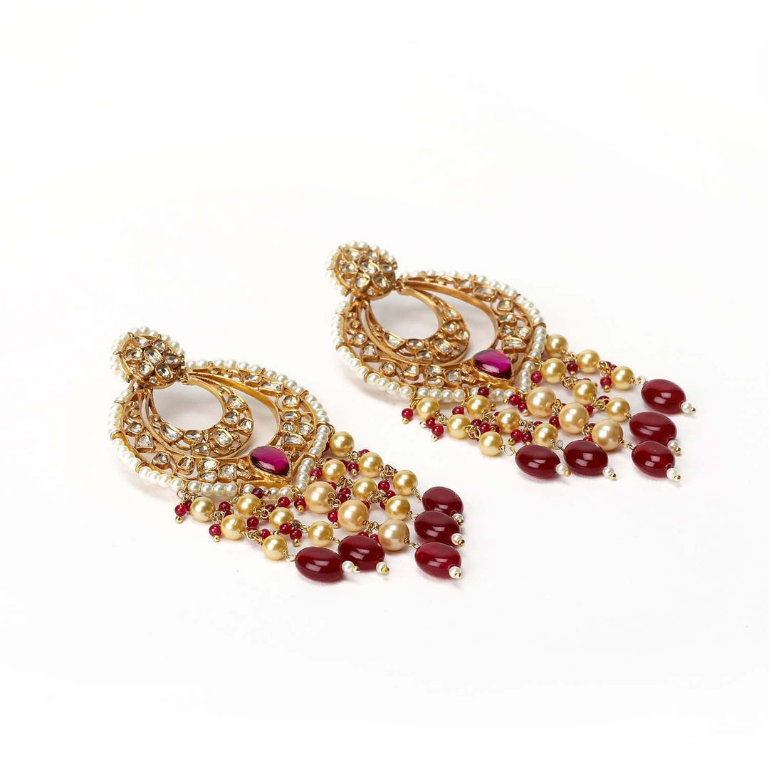  Exquisite Kundan earrings with ruby stones and pearl strings
