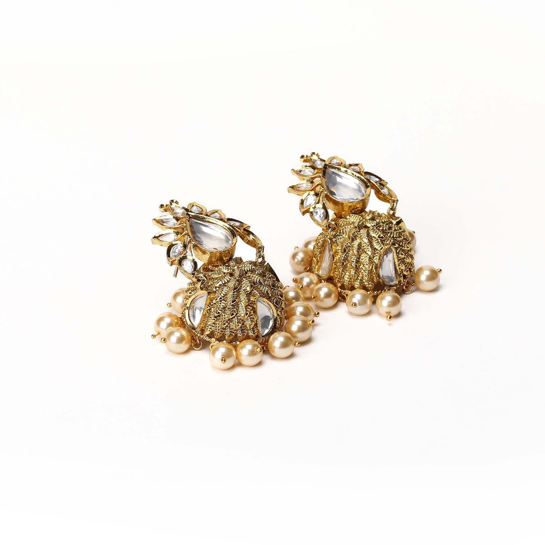  Beautiful gold plated jhumkas with small pearl hanging and kundan stones