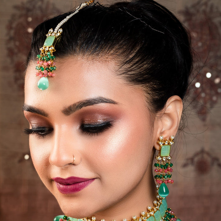 Aafizah Mint Green & Pink Gold Plated Choker Kundan Set with intricate detailing and vibrant colors