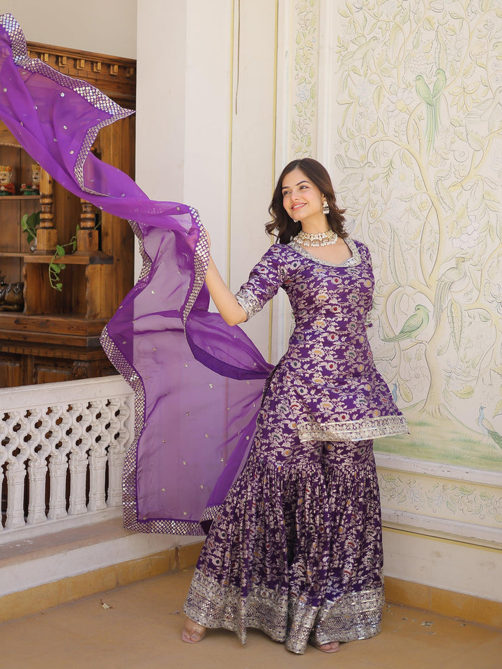 Beautiful Tantalizing Purple Embroidered Jacquard Wedding Wear Sharara Suit with intricate detailing and elegant design