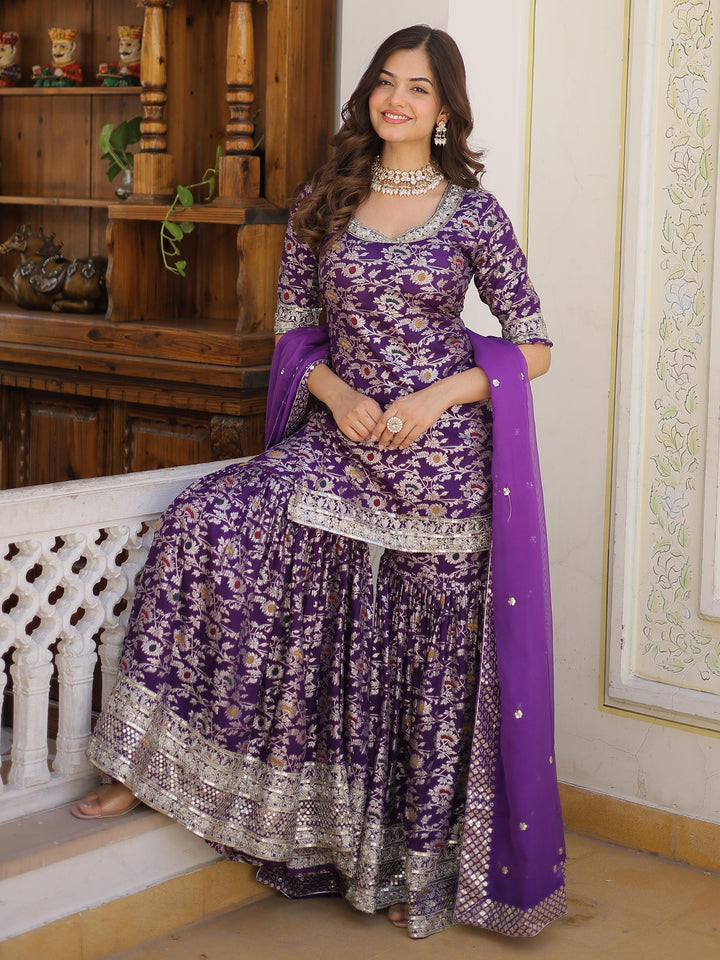 Beautiful purple embroidered jacquard wedding wear sharara suit with intricate detailing