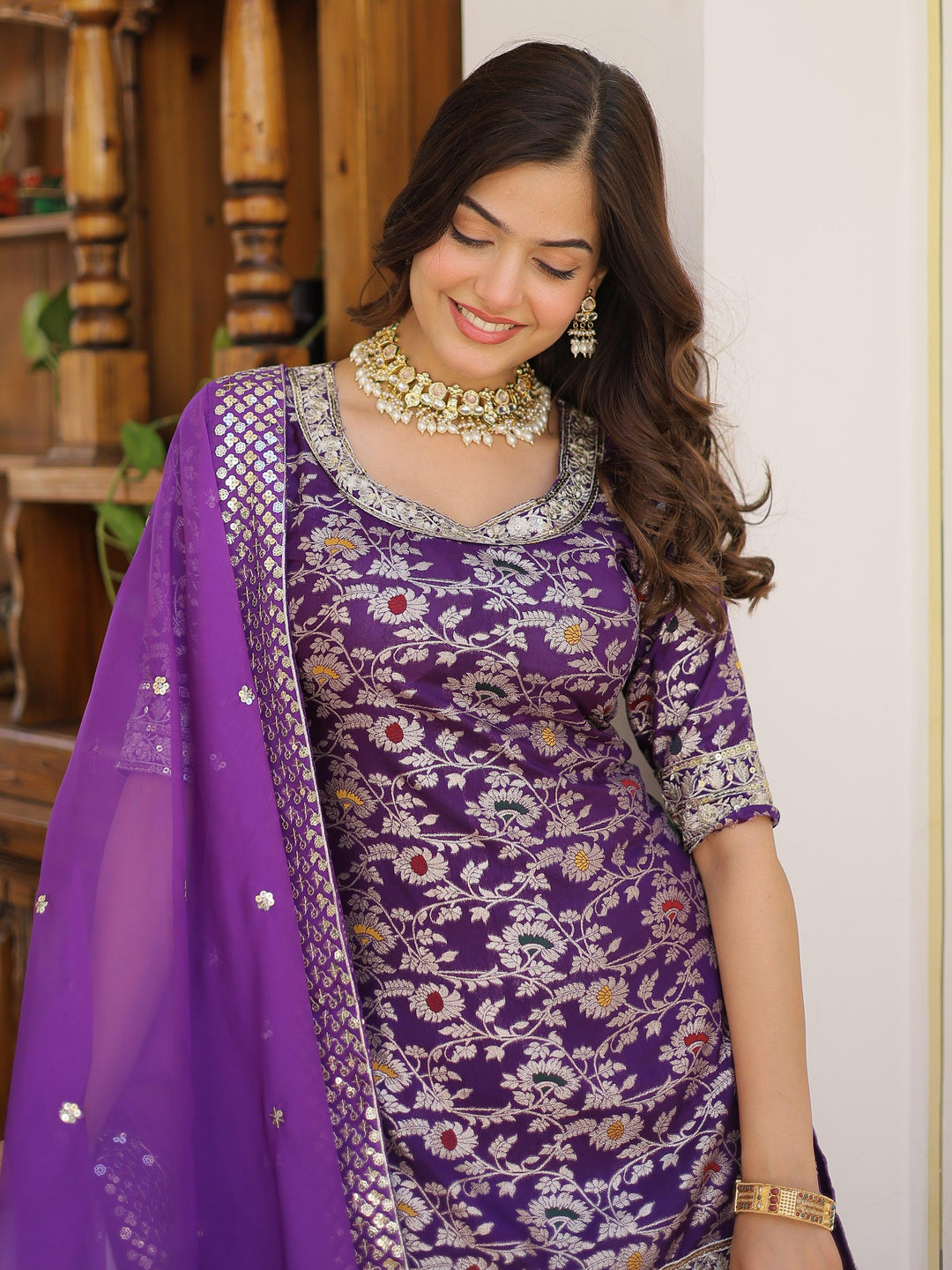 Tantalizing Purple Embroidered Jacquard Wedding Wear Sharara Suit with intricate detailing and elegant design