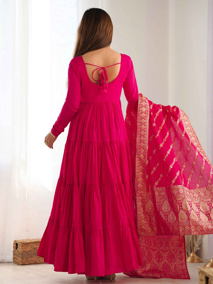 Hot pink chanderi pants perfectly complementing the anarkali's elegance