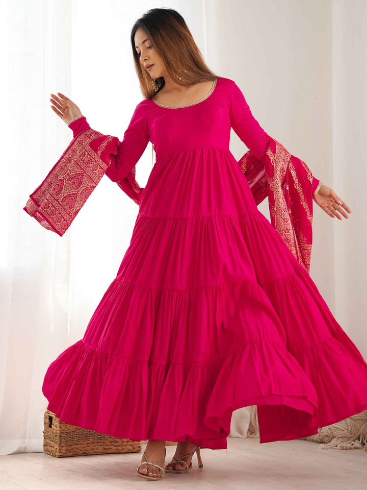 Sophisticated hot pink anarkali suit with matching dupatta and pants