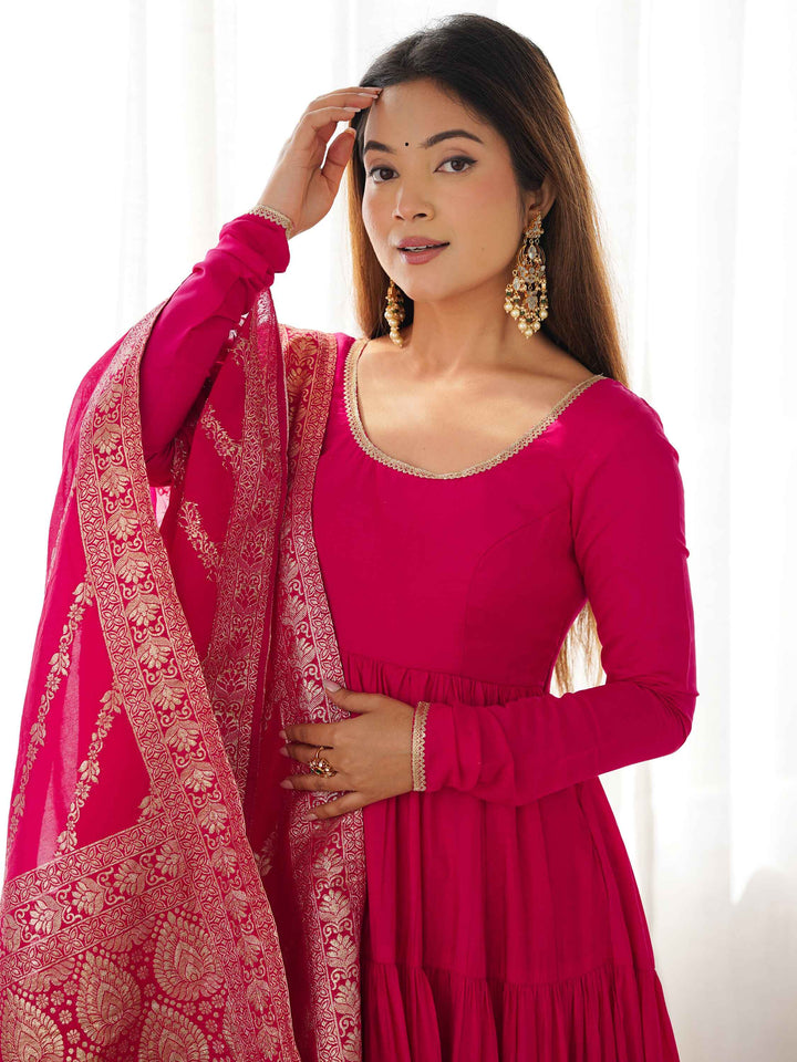 Exquisite hot pink banarsi silk dupatta completing the stunning outfit