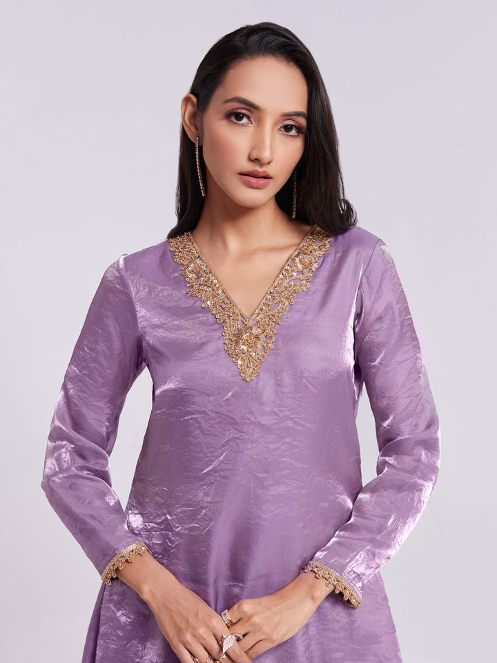 Elegant lilac organza kurta set with matching accessories and layered palazzo