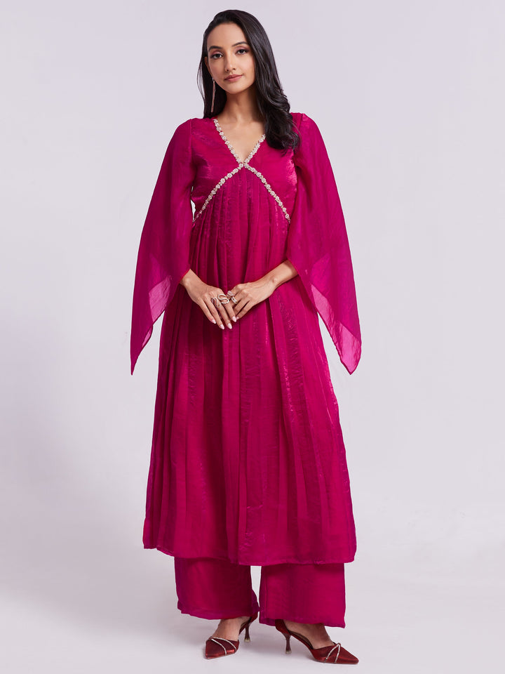 Beautiful pink organza kurta with intricate lace work and palazzo