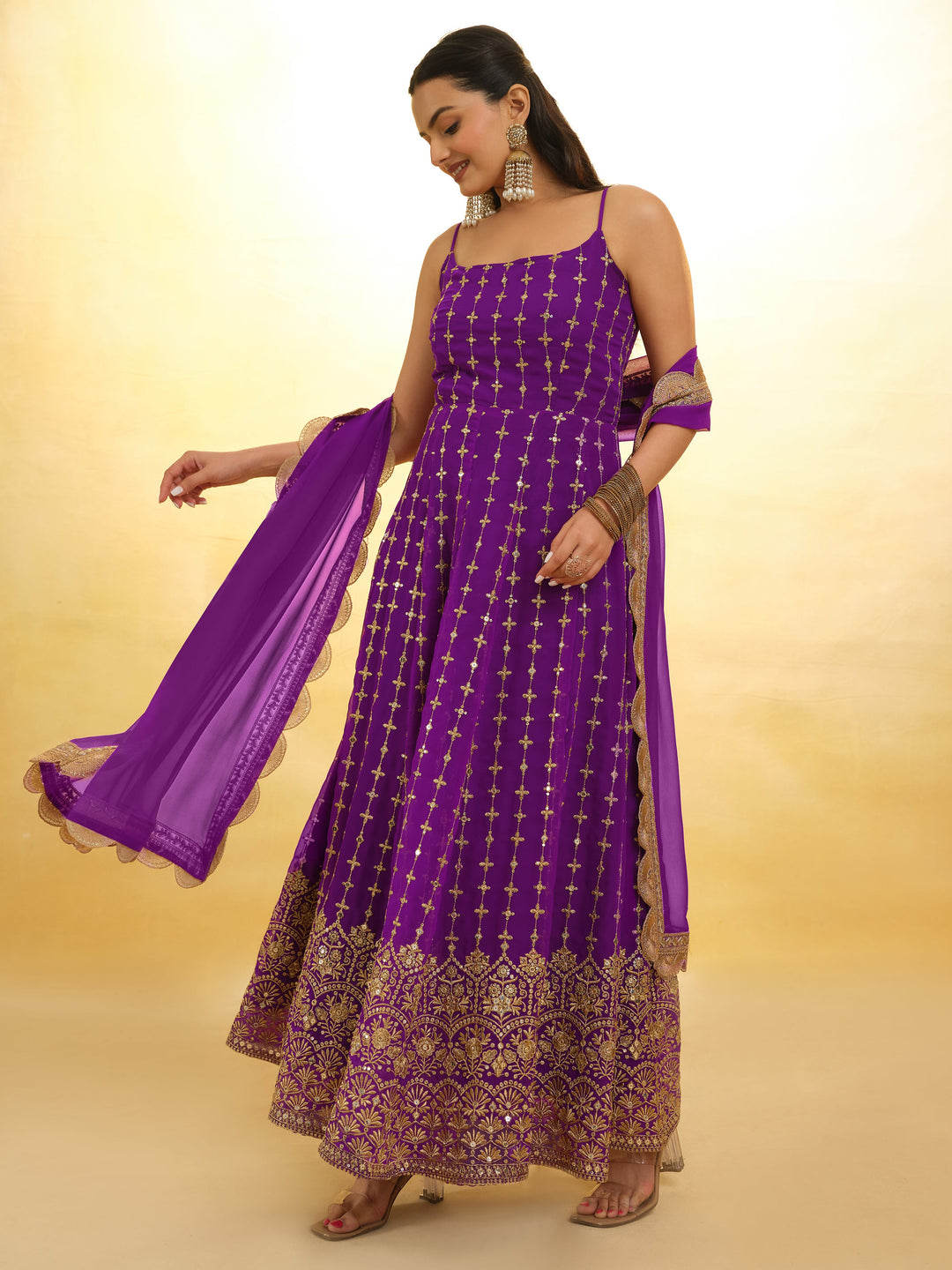 Captivating Purple Embroidered Georgette Wedding Wear Anarkali Suit with intricate detailing and elegant design