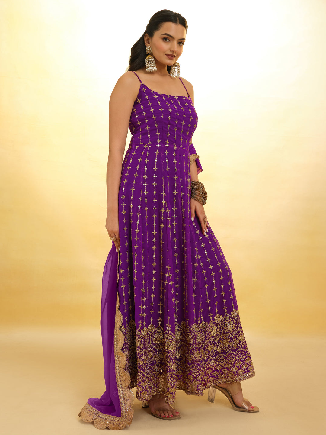 Captivating Purple Embroidered Georgette Wedding Wear Anarkali Suit with intricate detailing and elegant design