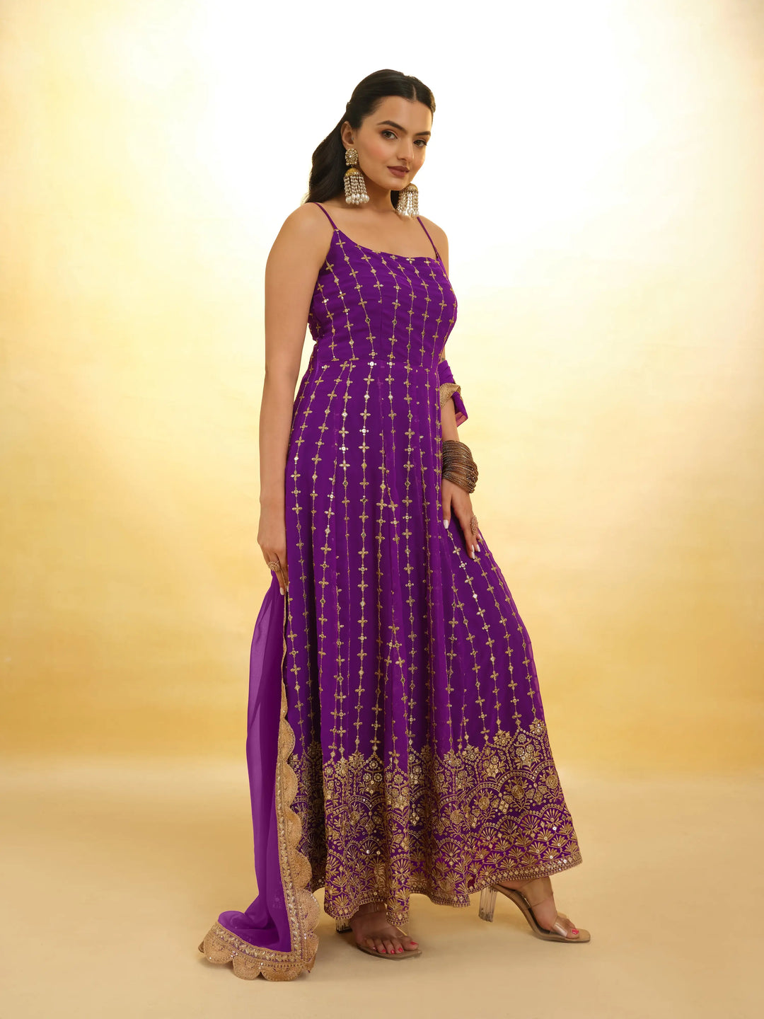 Beautiful purple salwar suit with intricate embroidery and traditional design