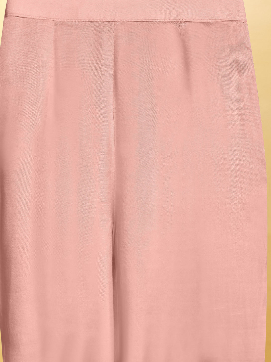 Charming baby pink suit with exquisite detailing