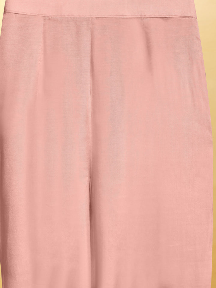 Charming baby pink suit with exquisite detailing