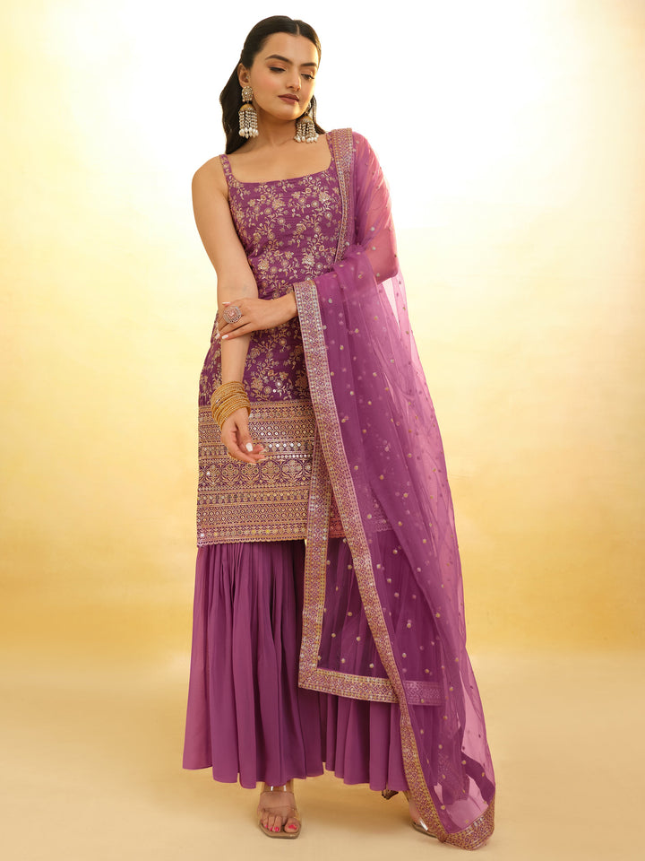 Delicate embroidery on luxurious purple sharara suit