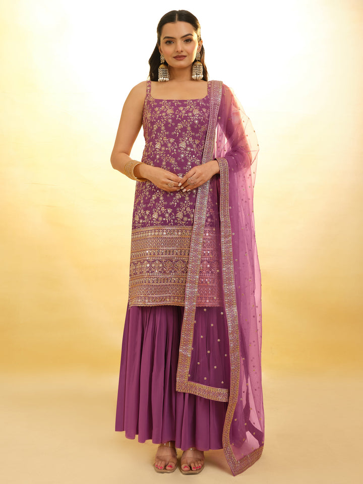 
Glamorous purple georgette sharara suit with intricate sequin work