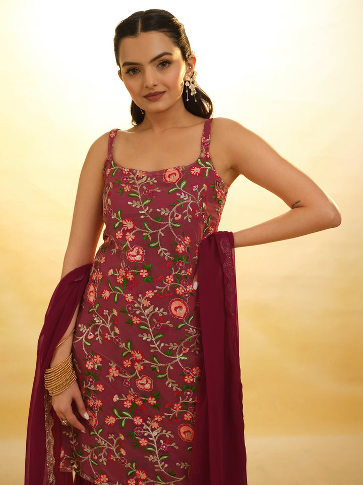 Fascinating maroon embroidered net festival wear sharara suit with intricate detailing and elegant design