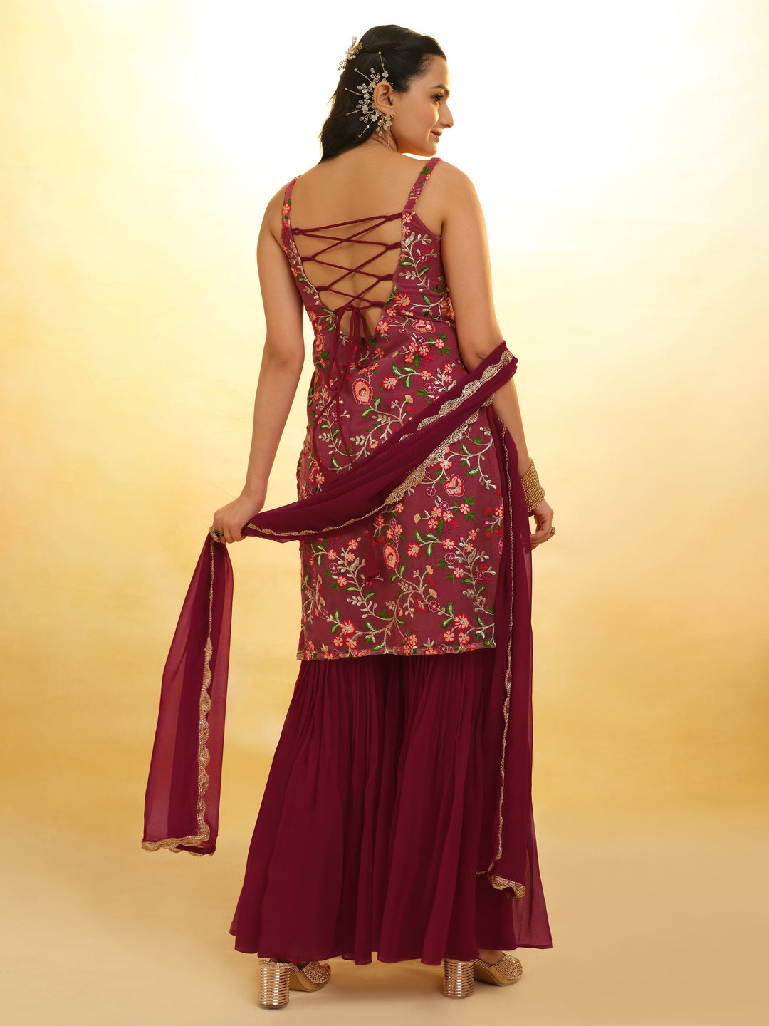Maroon embroidered net sharara suit with intricate detailing for festival wear