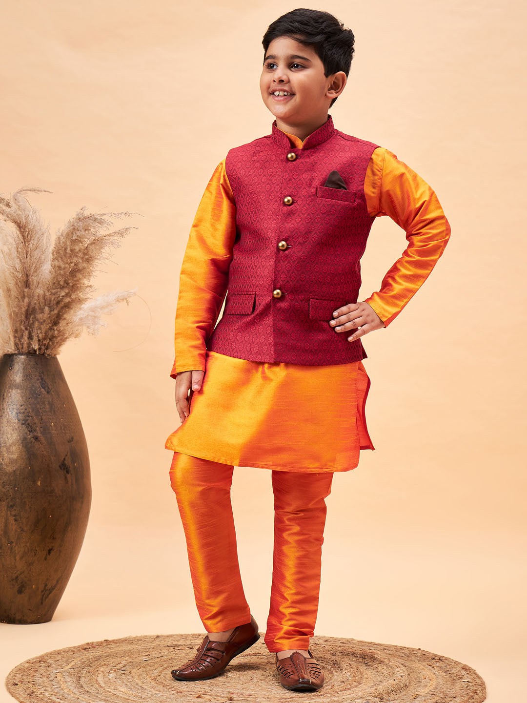 VASTRAMAY Boy's Maroon Woven Nehru Jacket With Orange Kurta And Pyjama Set - qivii