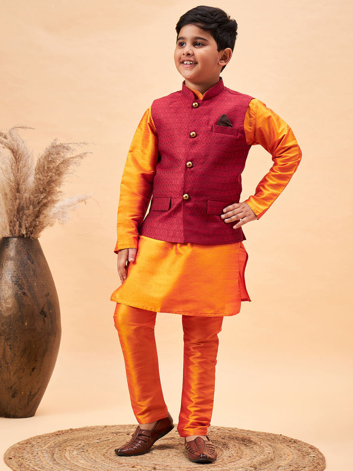 VASTRAMAY Boy's Maroon Woven Nehru Jacket With Orange Kurta And Pyjama Set - qivii