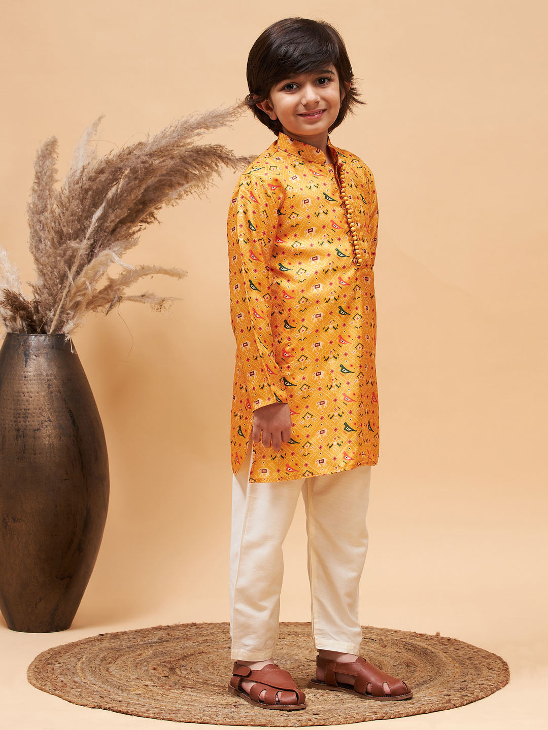 VASTRAMAY Boy's Yellow Patola Printed Kurta And Cream Pyjama Set - qivii