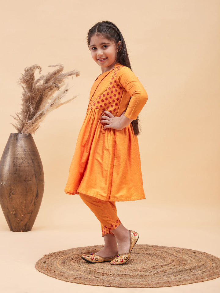 VASTRAMAY Girls Orange Anarkali Kurta Pyjama Set With Potli Bag - qivii