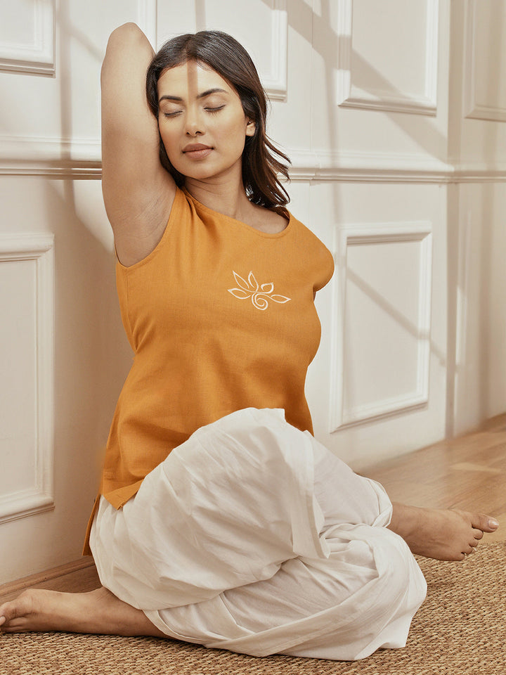Women's Dusty Saffron Embroidered Yoga Kurta With White Dhoti Pants