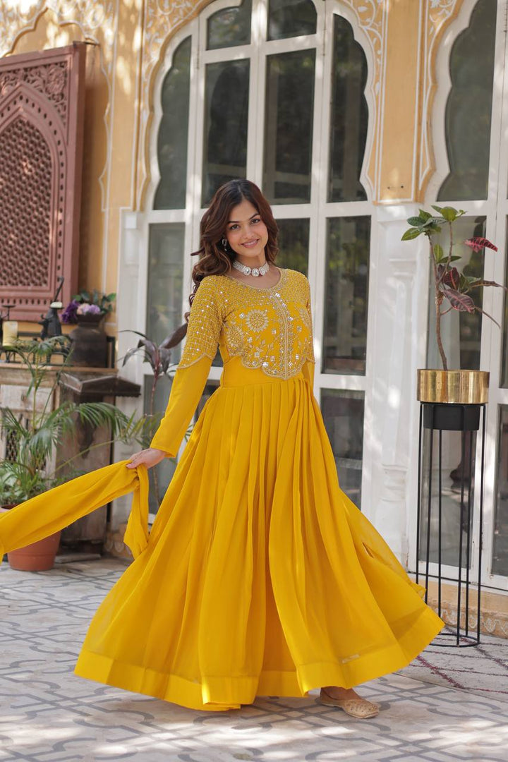 Yellow Faux Blooming Georgette With Attractive embroidered Work Gown - qivii