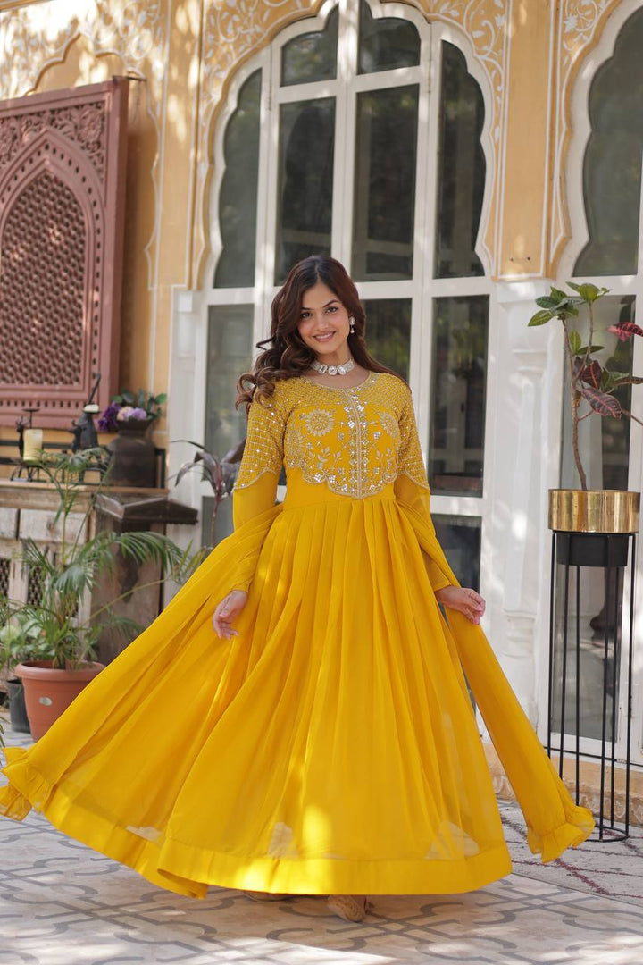 Yellow Faux Blooming Georgette With Attractive embroidered Work Gown - qivii