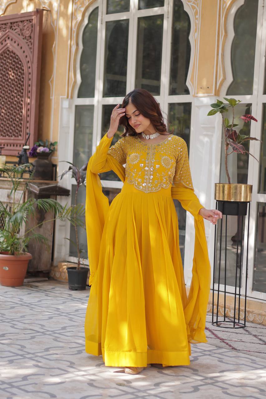Yellow Faux Blooming Georgette With Attractive embroidered Work Gown - qivii