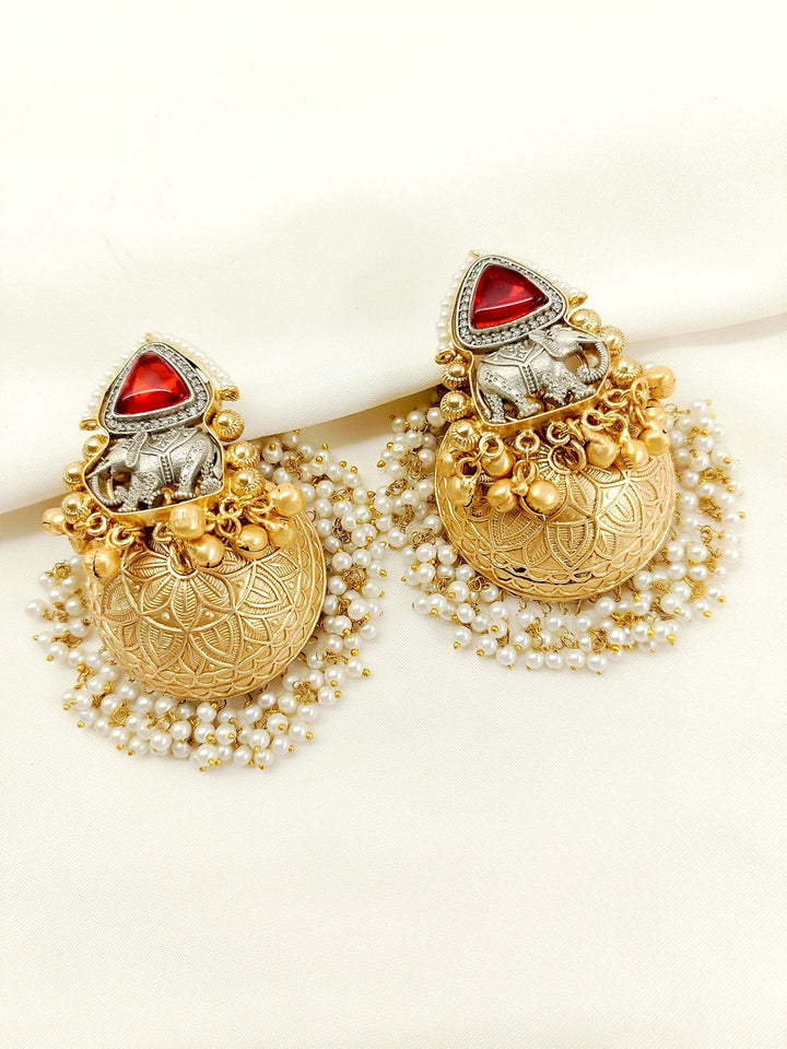 Gold plated brass metal Jhumki with traditional designs and pearl hangings