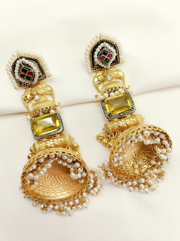 Sadhna Yellow Boutique Jhumki earrings crafted from gold plated brass
