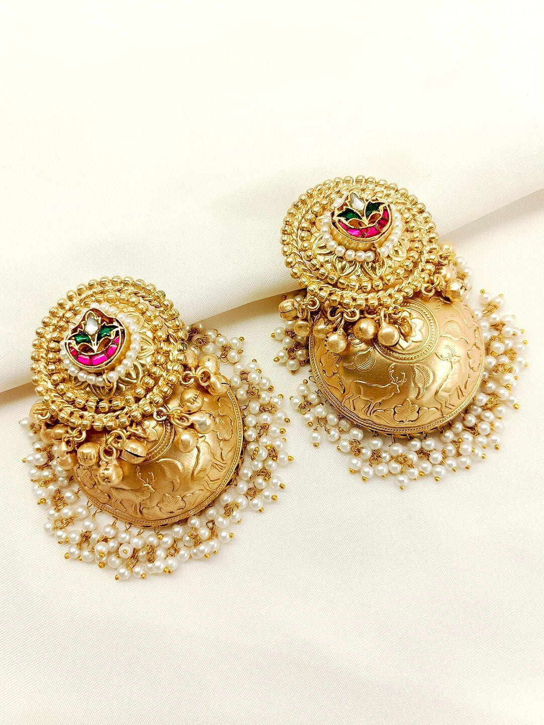 Handcrafted gold and red jhumki earrings from Harinakshi R & G Boutique